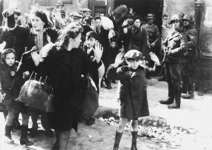 SS soldiers guarding the column of captive Jews in the Warsaw ghetto.